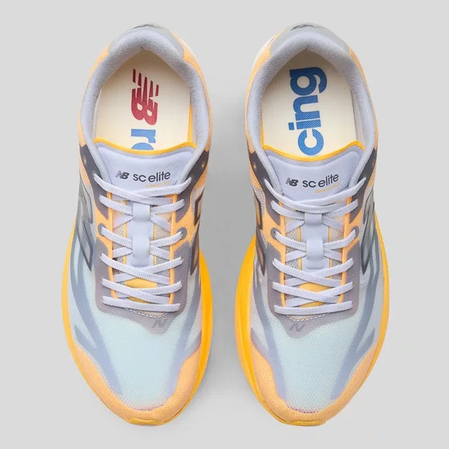 Tênis New Balance SuperComp Elite v6 Masculino Laranja Claro e Lilás