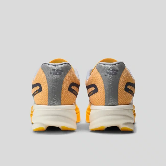 Tênis New Balance SuperComp Elite v6 Masculino Laranja Claro e Lilás