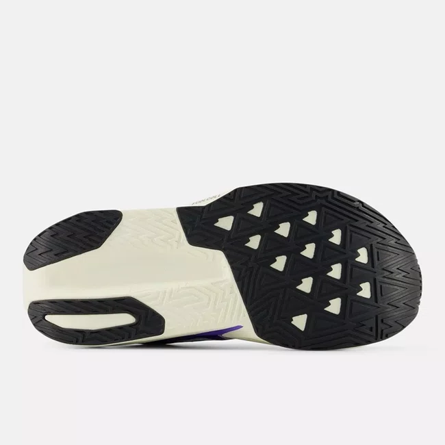 Tênis New Balance FuelCell Rebel v5 Feminino Roxo Claro