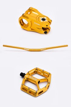 Kit Guidão + Mesa 50mm + Pedal Hupi Strip Dourado Kit Guidão + Mesa 50mm + Pedal Hupi Strip Dourado