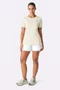 Camiseta New Balance Sport Essentials Feminina Off White