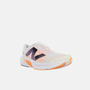 Tênis New Balance Fuelcell Rebel V4 Masculino Branco / Laranja